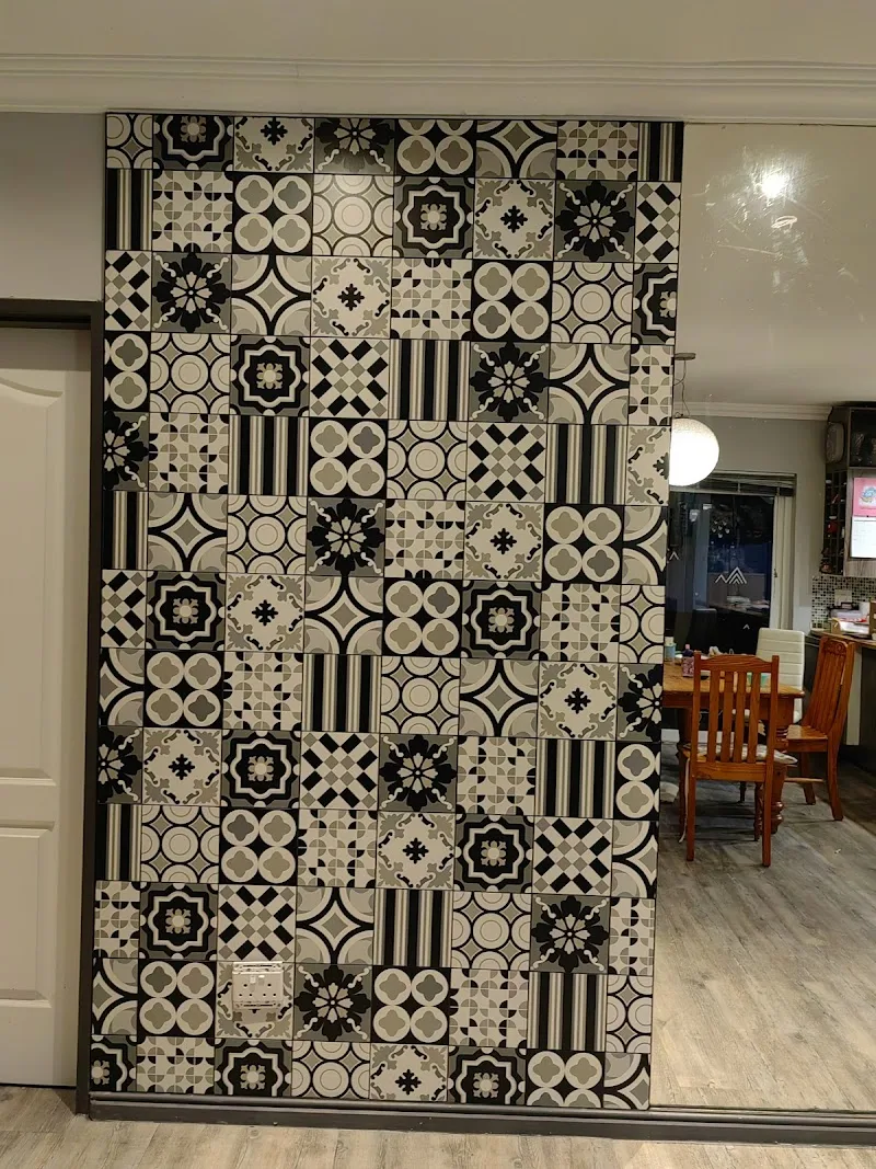 Decorative patterned tiled feature wall