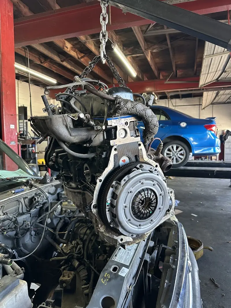 Engine repair work inside Liberty Auto Repair in Houston