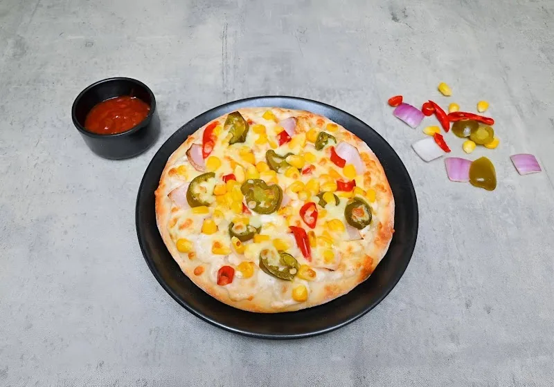 Da Pizza Puff, Bhagwati Garden, New Delhi — photo 6